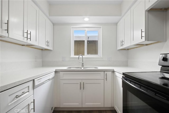 9867 Cornwall Dr, Huntington Beach, CA 92646 - kitchen featuring black range with electric cooktop, a sink, dishwasher, white cabinets, and recessed lighting