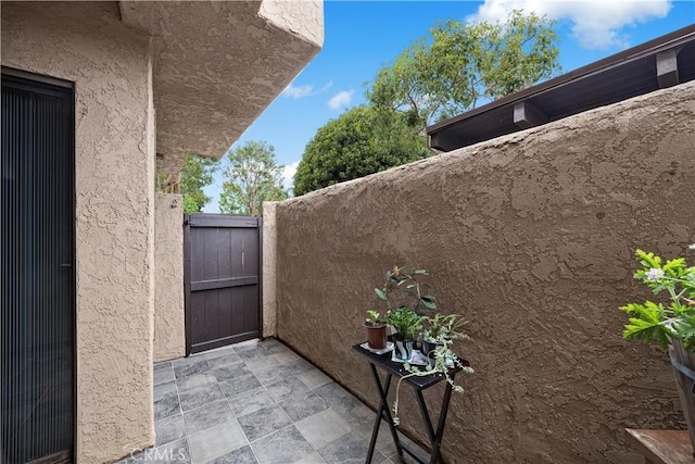 view of side of property featuring stucco siding