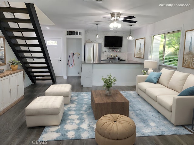 4900 E Chapman Ave Unit 86, Orange, CA 92869 - living room featuring stairs, a ceiling fan, and dark wood-style flooring