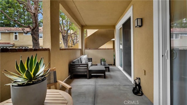 view of patio / terrace featuring a balcony