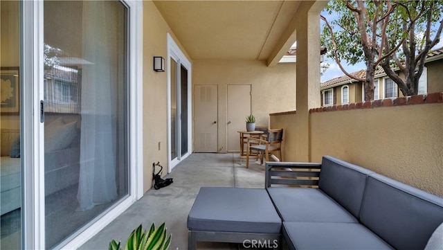 balcony with an outdoor hangout area