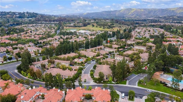 bird's eye view featuring a mountain view and a residential view