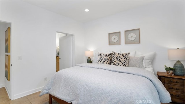 bedroom with recessed lighting, baseboards, and tile patterned flooring