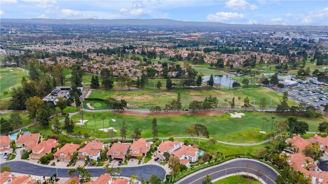 birds eye view of property with a residential view, view of golf course, and a water view