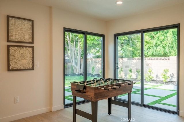 23919 Friar St, Woodland Hills, CA 91367 - rec room with light wood-style flooring, baseboards, and recessed lighting