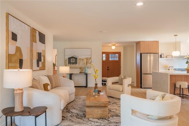23919 Friar St, Woodland Hills, CA 91367 - living area with light wood-type flooring and recessed lighting