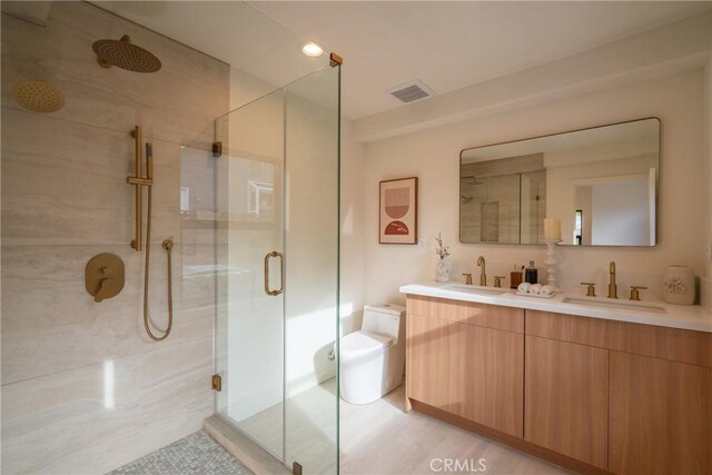 23919 Friar St, Woodland Hills, CA 91367 - full bath with a shower stall, double vanity, and toilet
