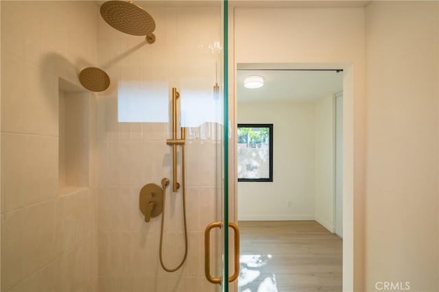 23919 Friar St, Woodland Hills, CA 91367 - full bath with a tile shower and wood finished floors