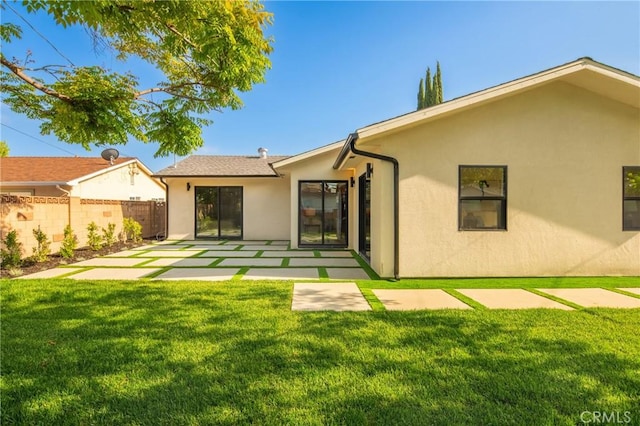 23919 Friar St, Woodland Hills, CA 91367 - back of property featuring stucco siding and a patio