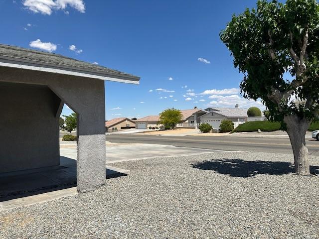view of yard featuring a residential view