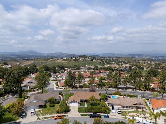 bird's eye view with a mountain view and a residential view
