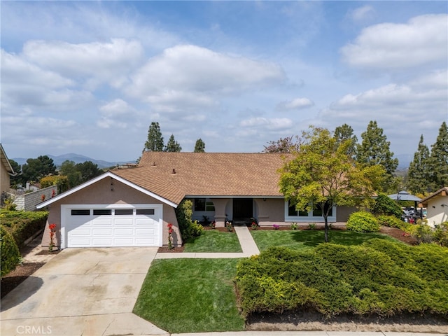 3563 Quarzo Cir, Thousand Oaks, CA 91362 - single story home featuring stucco siding, a front lawn, concrete driveway, and an attached garage