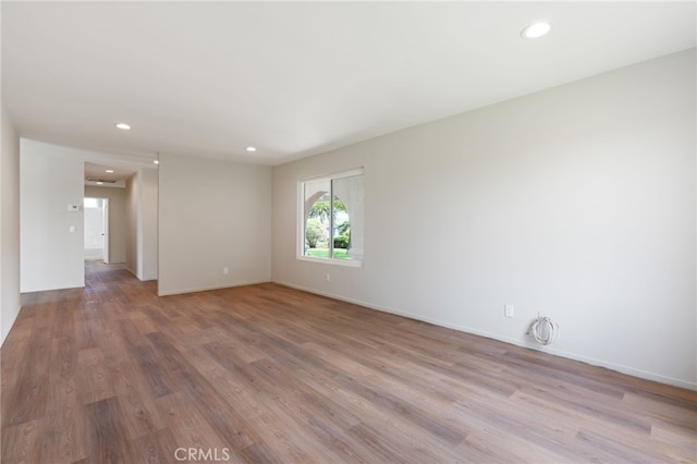 3563 Quarzo Cir, Thousand Oaks, CA 91362 - empty room featuring wood finished floors, recessed lighting, and baseboards