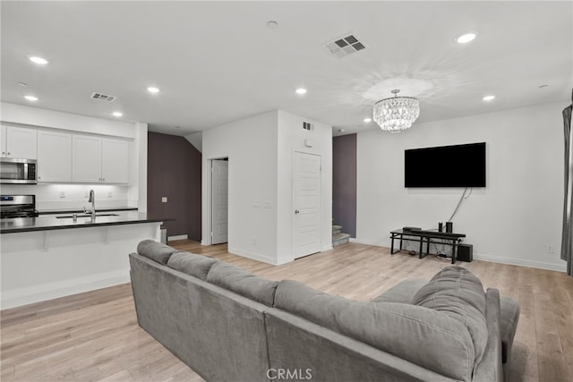 12814 Watt Ln Unit B, Sylmar, CA 91342 - living area with recessed lighting and visible vents