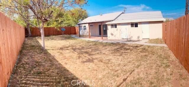 5214 Golden Ave, Riverside, CA 92505 - rear view of property featuring a fenced backyard and a patio area