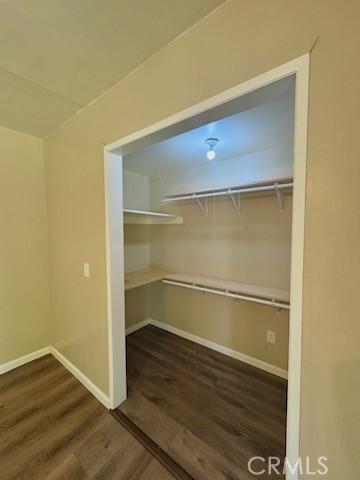 5214 Golden Ave, Riverside, CA 92505 - walk in closet with wood finished floors