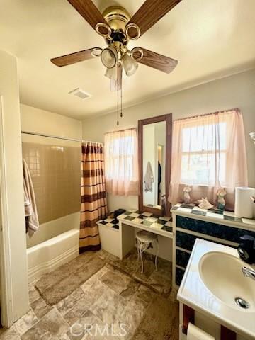 5214 Golden Ave, Riverside, CA 92505 - full bathroom with vanity, ceiling fan, shower / bath combo, and a wealth of natural light