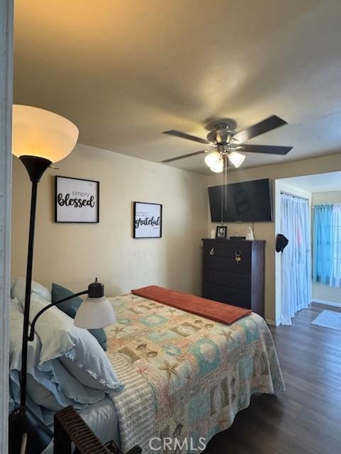 5214 Golden Ave, Riverside, CA 92505 - bedroom with a ceiling fan and dark wood finished floors