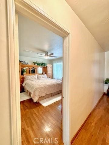5214 Golden Ave, Riverside, CA 92505 - bedroom with a ceiling fan and wood finished floors