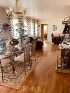 5214 Golden Ave, Riverside, CA 92505 - dining area featuring plenty of natural light and wood finished floors