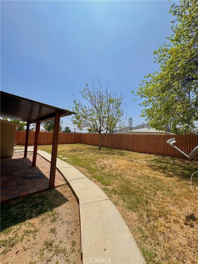 5214 Golden Ave, Riverside, CA 92505 - view of yard with a fenced backyard and a patio area