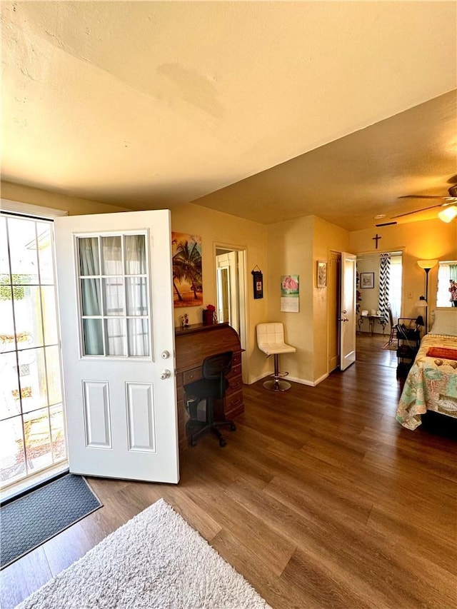 5214 Golden Ave, Riverside, CA 92505 - foyer featuring a ceiling fan, baseboards, a wealth of natural light, and wood finished floors