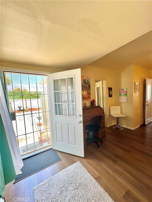 5214 Golden Ave, Riverside, CA 92505 - entryway featuring baseboards and wood finished floors