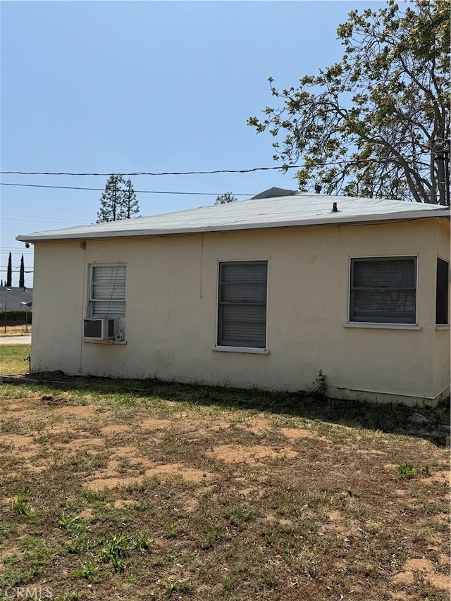 5214 Golden Ave, Riverside, CA 92505 - view of property exterior with stucco siding and cooling unit