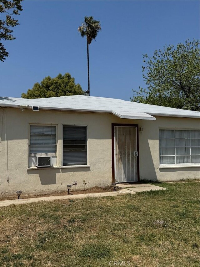5214 Golden Ave, Riverside, CA 92505 - view of front of house with stucco siding and a front yard