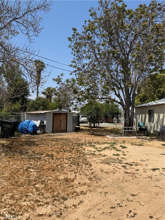 5214 Golden Ave, Riverside, CA 92505 - view of yard with an outdoor structure