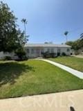 5214 Golden Ave, Riverside, CA 92505 - view of front facade with a front yard