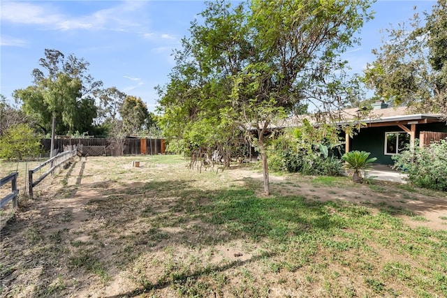 view of yard featuring fence
