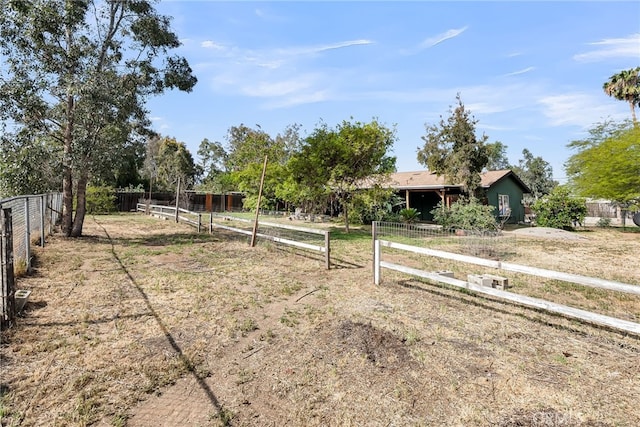 view of yard featuring fence