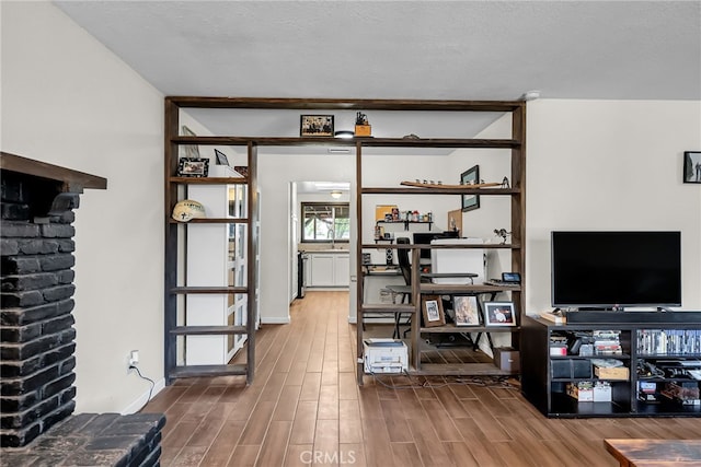 living room with wood finished floors