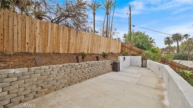 5092 Myrtle Ave, Riverside, CA 92506 - view of patio with a fenced backyard
