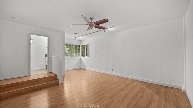 5092 Myrtle Ave, Riverside, CA 92506 - spare room with baseboards, light wood-style flooring, and ceiling fan