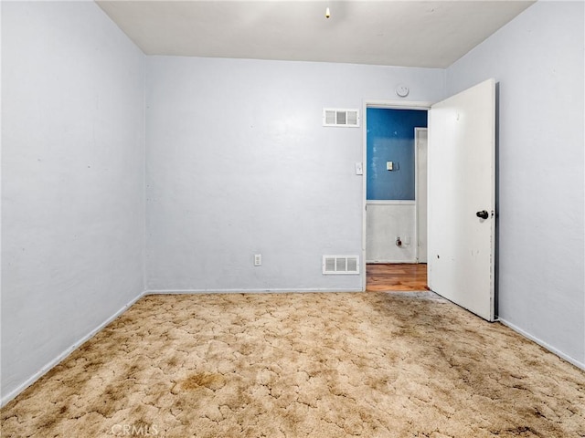 449 Highland Ave, Barstow, CA 92311 - carpeted empty room featuring baseboards and visible vents