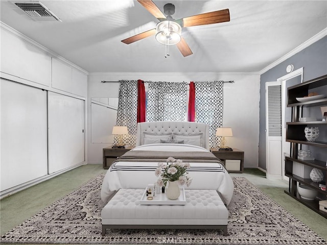 449 Highland Ave, Barstow, CA 92311 - bedroom with visible vents, ornamental molding, ceiling fan, and light colored carpet