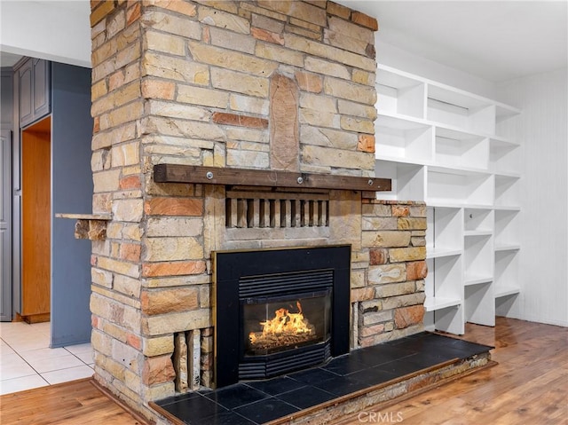 449 Highland Ave, Barstow, CA 92311 - interior details with wood finished floors and a fireplace