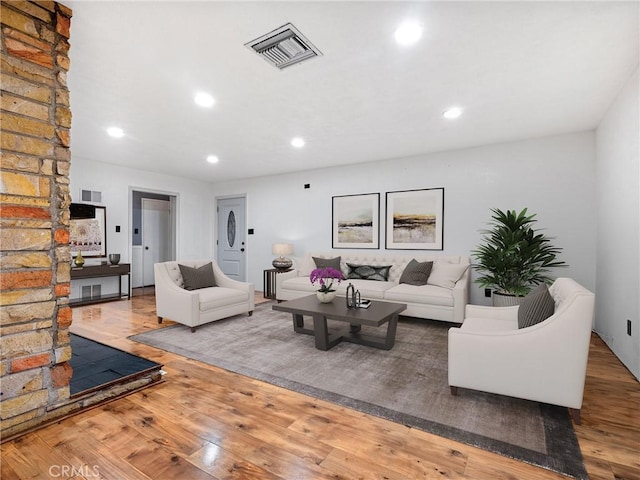 449 Highland Ave, Barstow, CA 92311 - living area with recessed lighting, visible vents, and wood finished floors