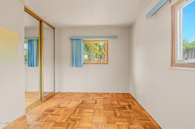 unfurnished room with plenty of natural light
