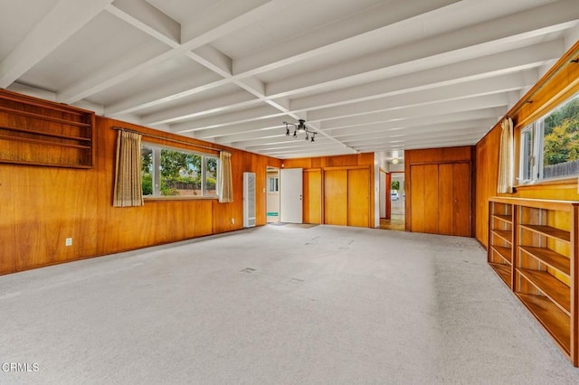 interior space featuring beamed ceiling
