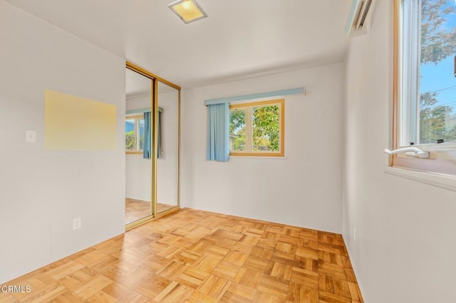 unfurnished bedroom with a closet