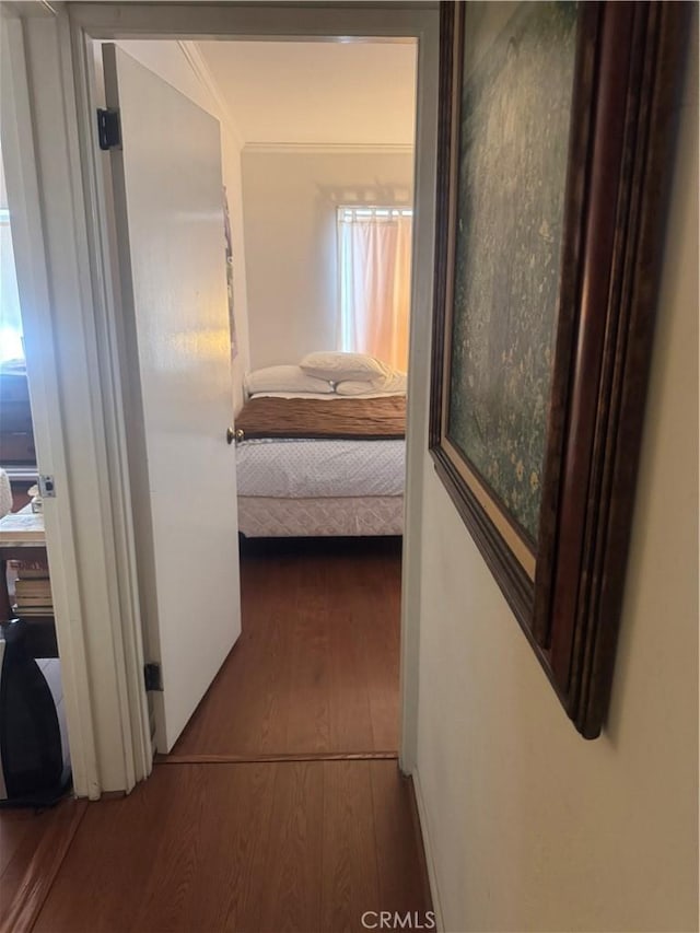 hall with wood finished floors