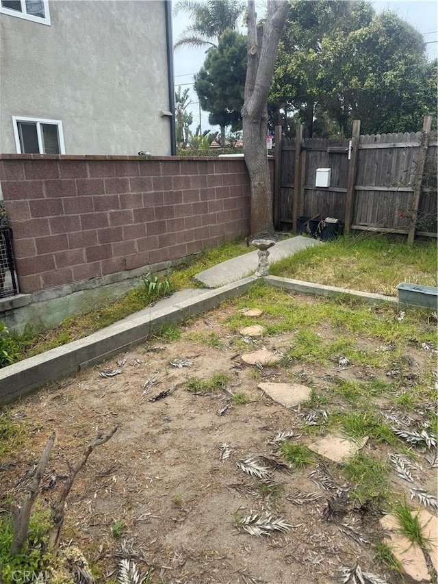 view of yard featuring fence