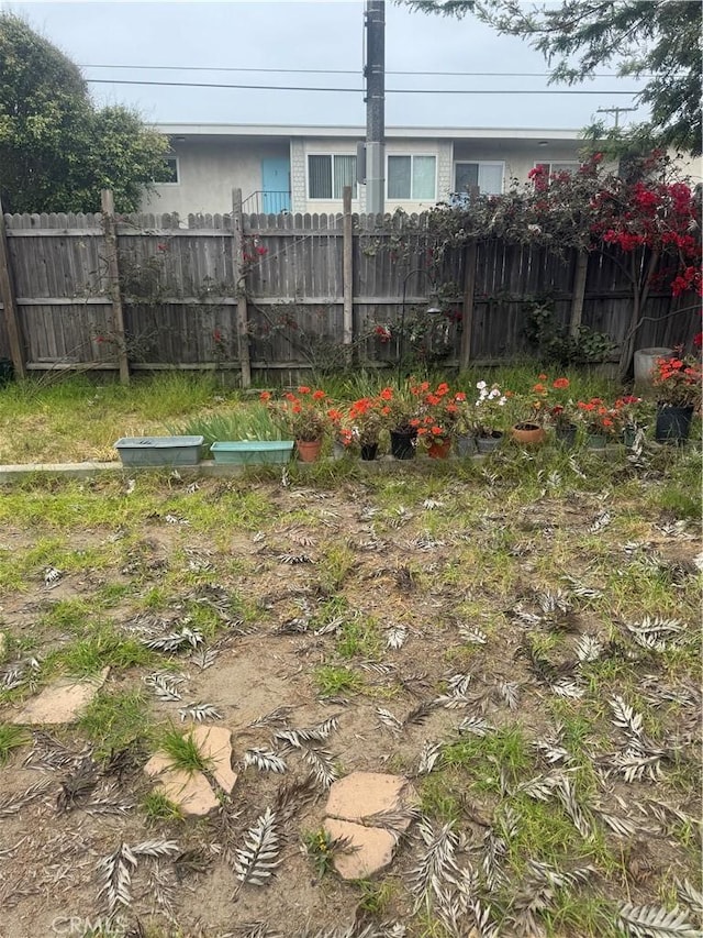 view of yard featuring fence