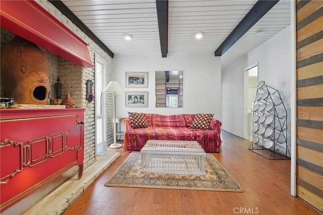 2218 Pacific Ave, Venice, CA 90291 - sitting room with wood finished floors, beamed ceiling, and wooden ceiling