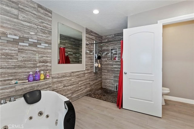 18060 Walnut St, Hesperia, CA 92345 - bathroom featuring tiled shower, a tub with jets, toilet, wood finished floors, and recessed lighting