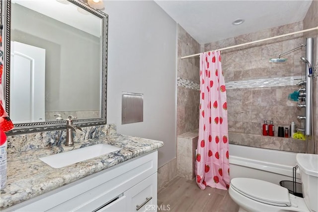 18060 Walnut St, Hesperia, CA 92345 - bathroom featuring vanity, shower / bathtub combination with curtain, toilet, and wood finished floors