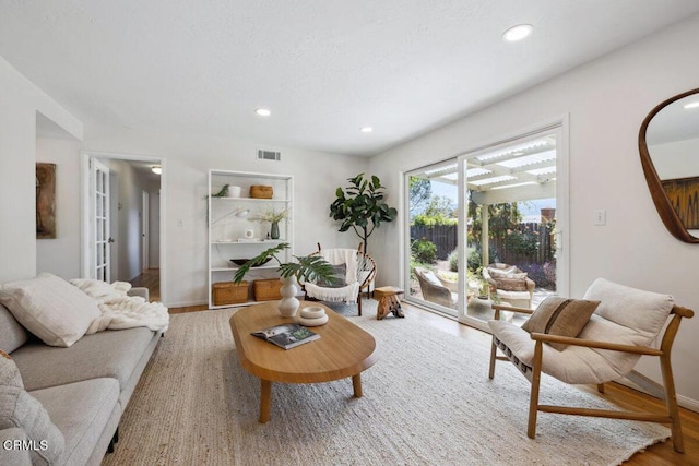 921 Topaz Ct, Ojai, CA 93023 - living room with baseboards, recessed lighting, wood finished floors, and visible vents